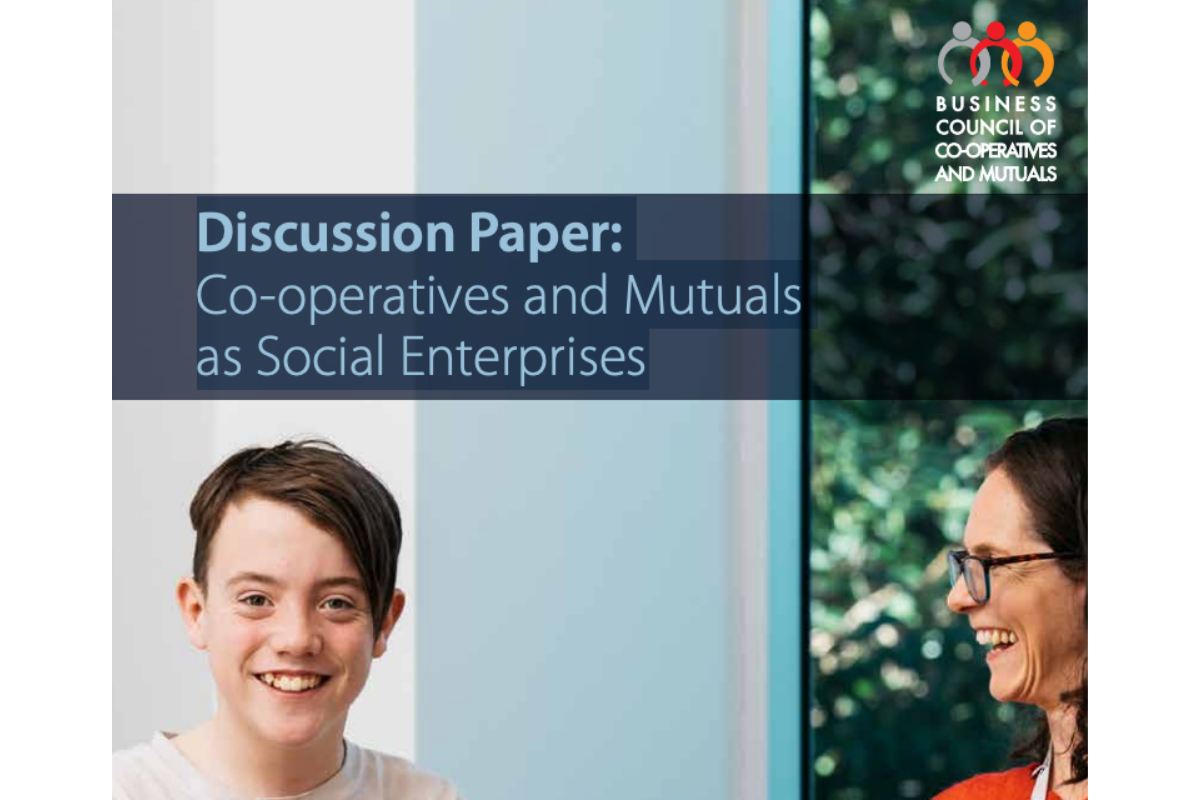 Business Council of Co-operatives and Mutuals report cover titled "Discussion Paper: Co-operatives and Mutuals as Social Enterprises," featuring split photos of two smiling people beside the organisation's logo.