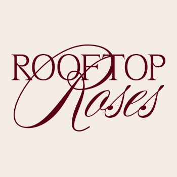 Maroon wordmark logo reading "Rooftop" in serif capitals with "Roses" in elegant cursive script beneath, on a cream background.